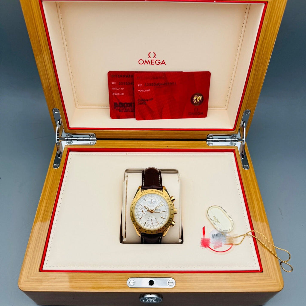 Gold Omega watch in a wooden box 